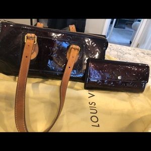Maroon Lous Vuitton purse and wallet.